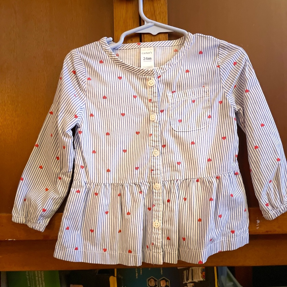 Carter’s size 24 Months long sleeve.